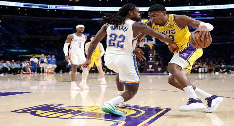 Rui Hachimura of the Los Angeles Lakers drives to the basket against Cason Wallace of the OKC Thunder during the April 7 2026 NBA game at Crypto.com Arena