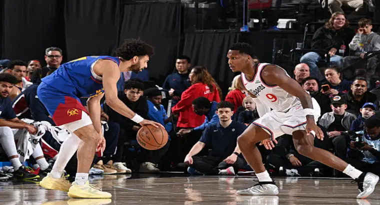 LA Clippers guard Bennedict Mathurin #9 defending against Denver Nuggets player during 115-114 win on February 19 2026 at Intuit Dome