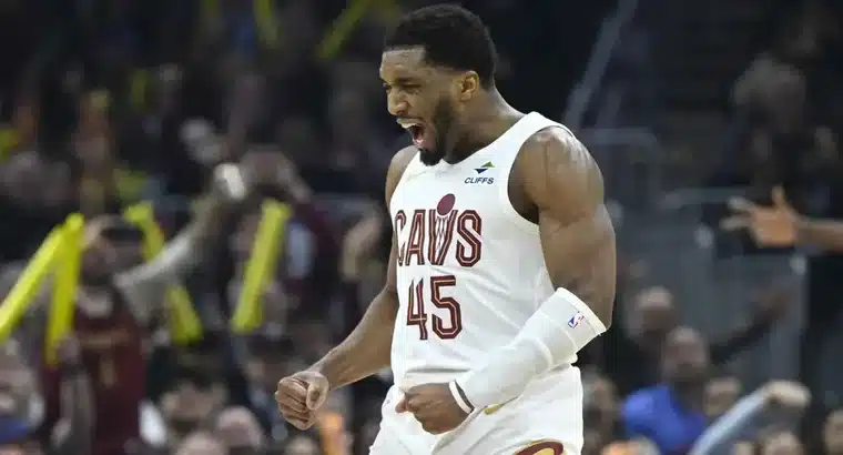 Donovan Mitchell celebrating a big moment for the Cleveland Cavaliers in an NBA game