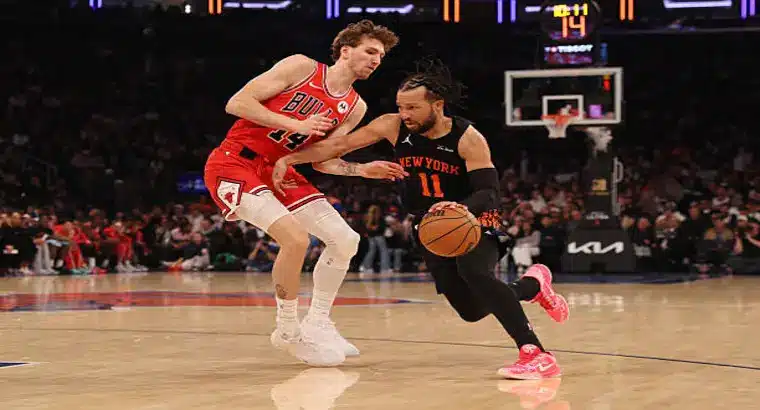 New York Knicks guard Jalen Brunson dribbling past Chicago Bulls forward Matas Buzelis during their April 3, 2026, matchup at MSG.