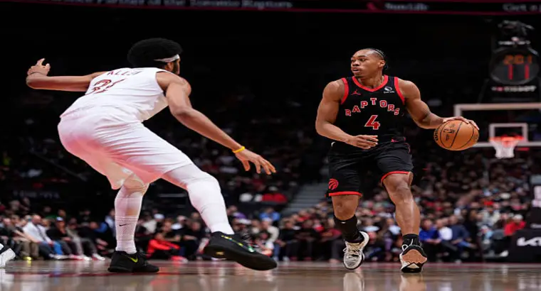 Scottie Barnes of the Toronto Raptors holding the ball in an isolation play against a Cleveland Cavaliers defender during Game 3 of the 2026 NBA Playoffs